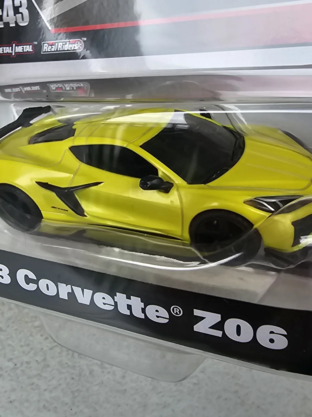 Hot Wheels Premium 1:43 2023 Corvette Z06 Yellow Real Riders Chevy